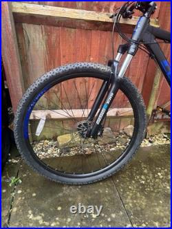 Carrera Hellcat 29 wheels mountain bike. M frame with blue and black detailing