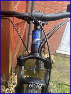 Carrera Hellcat 29 wheels mountain bike. M frame with blue and black detailing