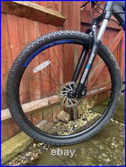 Carrera Hellcat 29 wheels mountain bike. M frame with blue and black detailing